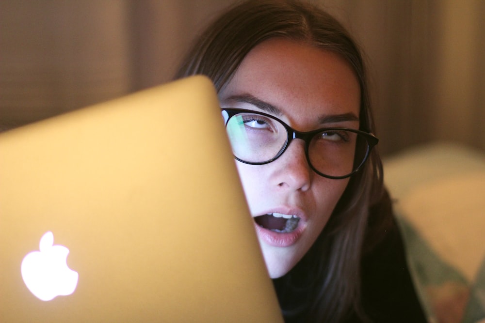 woman in black framed eyeglasses