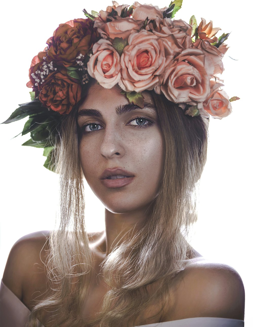 woman with red rose on her head