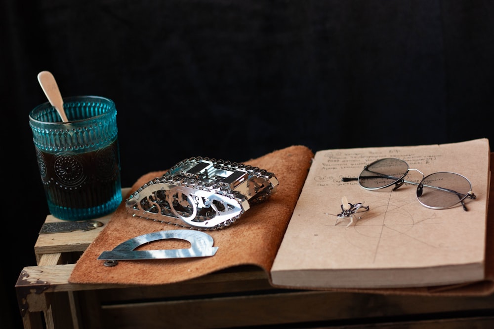 silver and black ring on brown wooden board