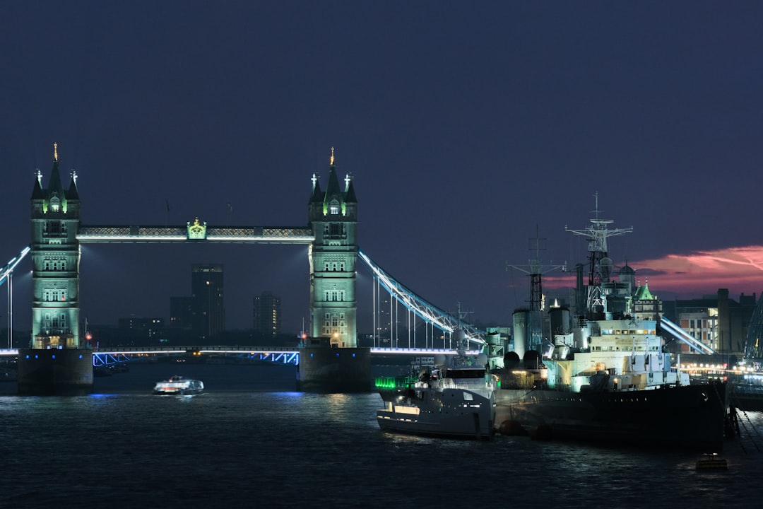 white and green tower bridge during night time