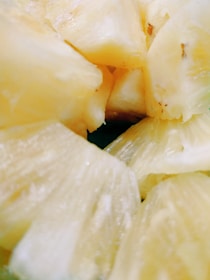 A close-up of juicy pineapple slices arranged beautifully.