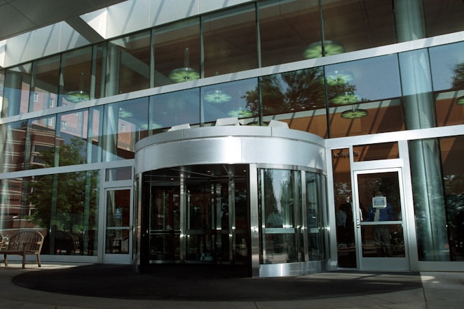 Modern automatic door installation in a sleek commercial building entrance.