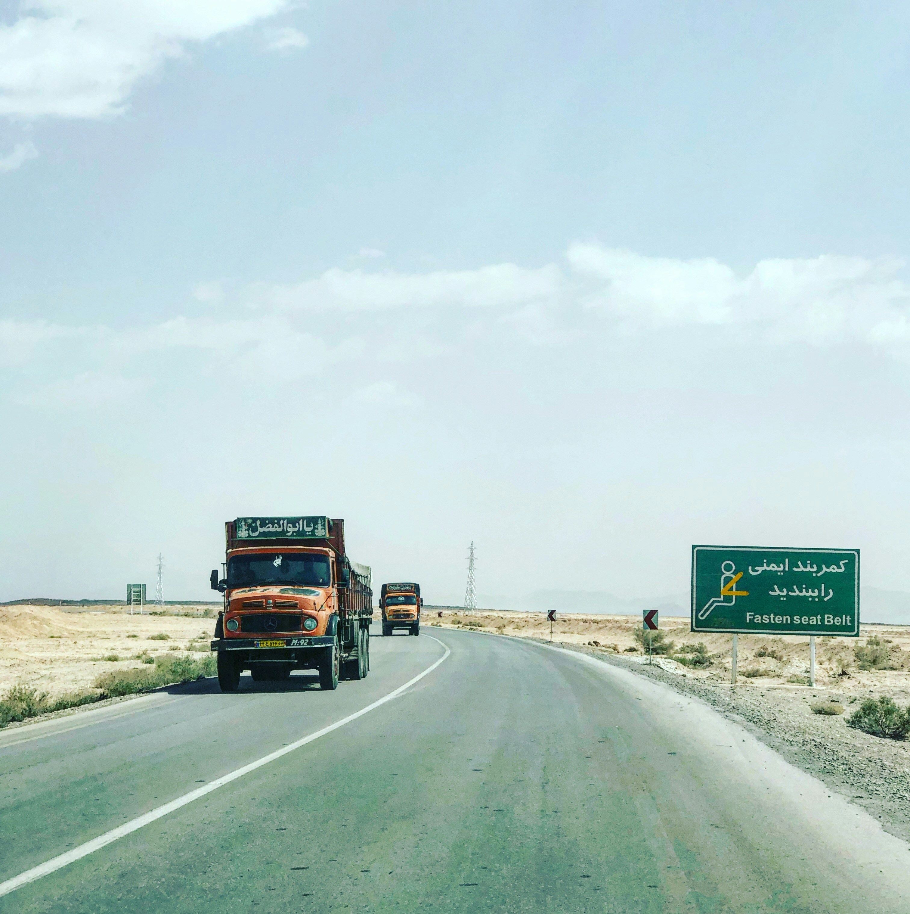 red truck on road during daytime