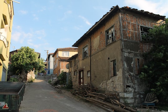 brown concrete building near green trees during daytime in Gölyazı Turkey