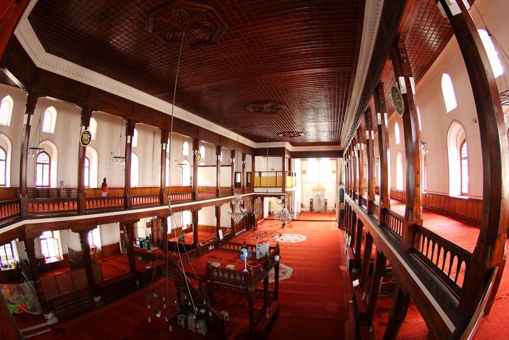 brown wooden chairs and tables inside restaurant