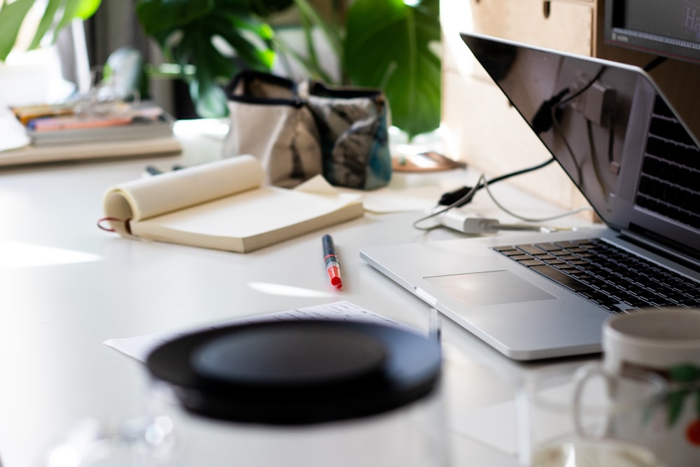 black round portable speaker on white table