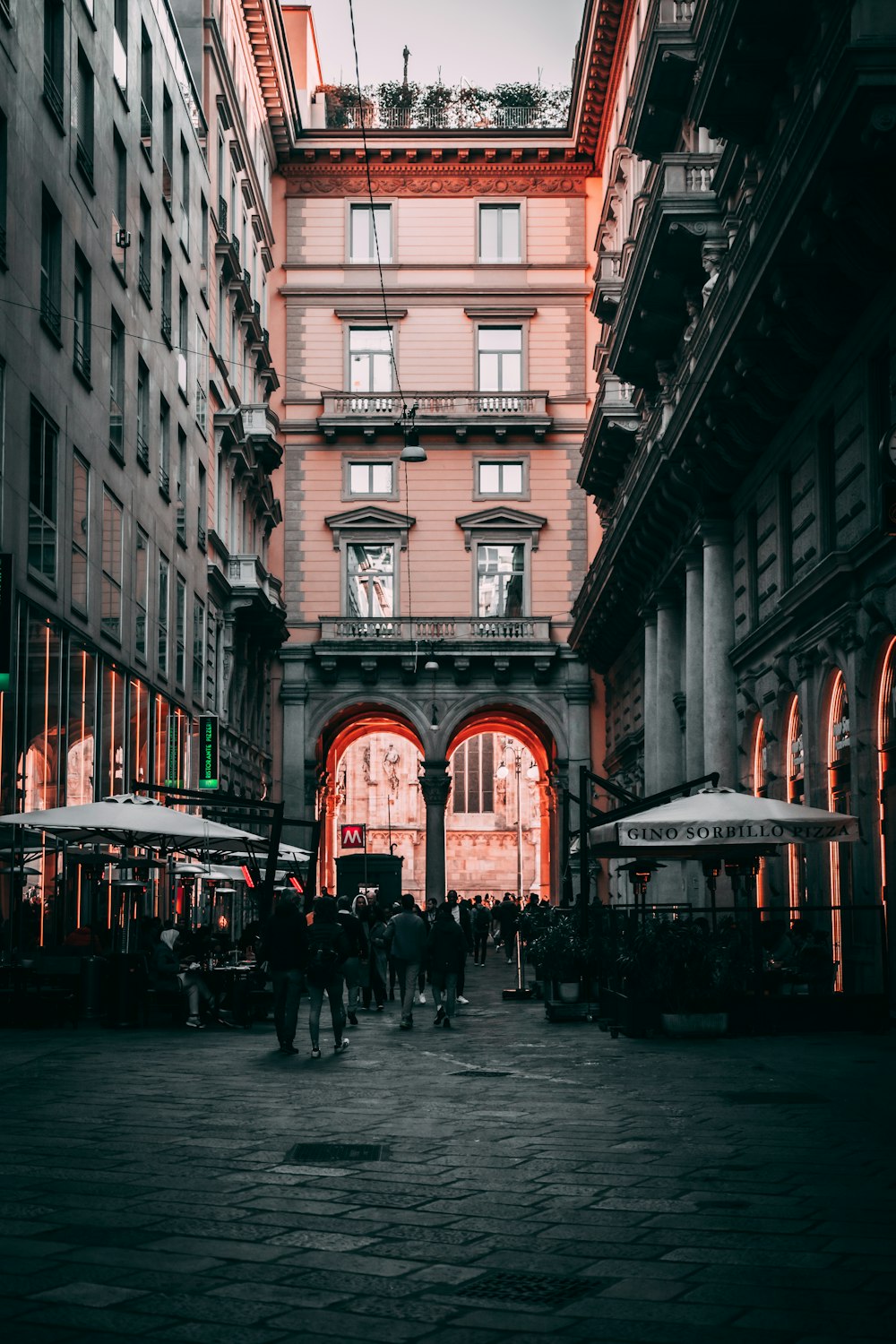 people walking on street near building during daytime