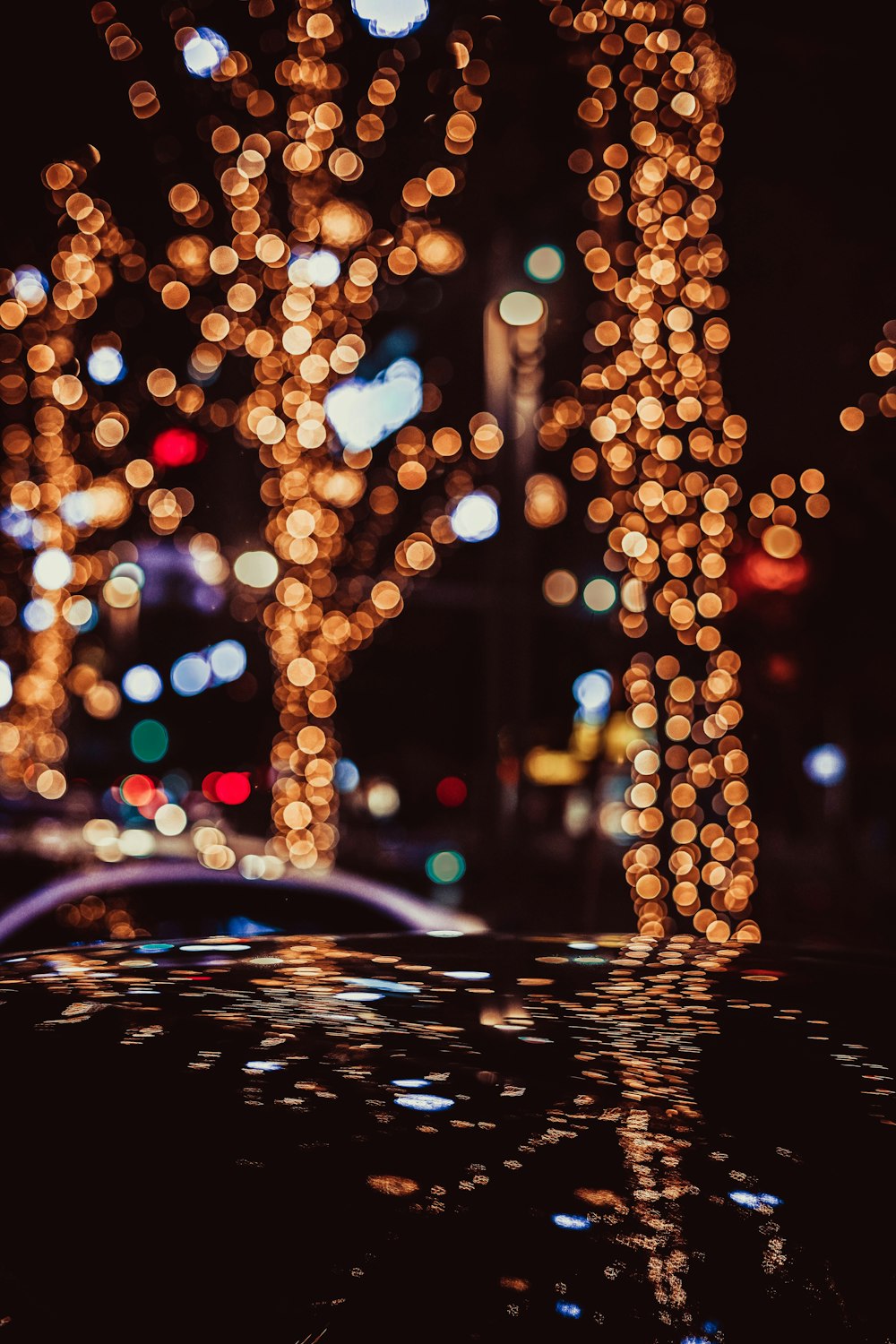 water droplets on glass during night time