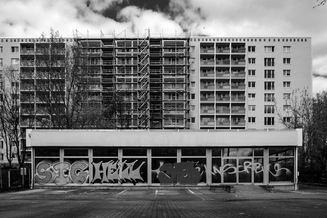 grayscale photo of city buildings