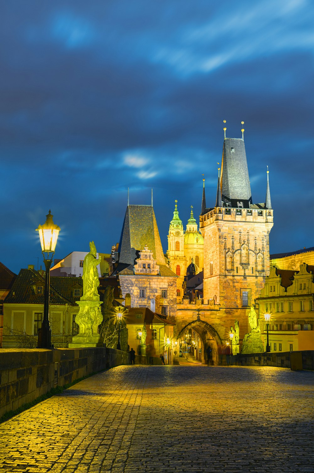 beige and green castle under cloudy sky