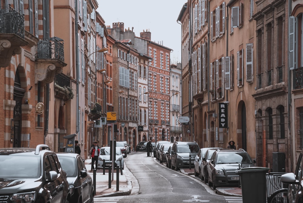 cars parked on the side of the road during daytime