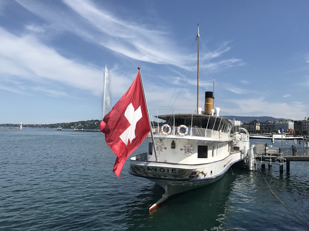 a large white boat with a canadian flag on it