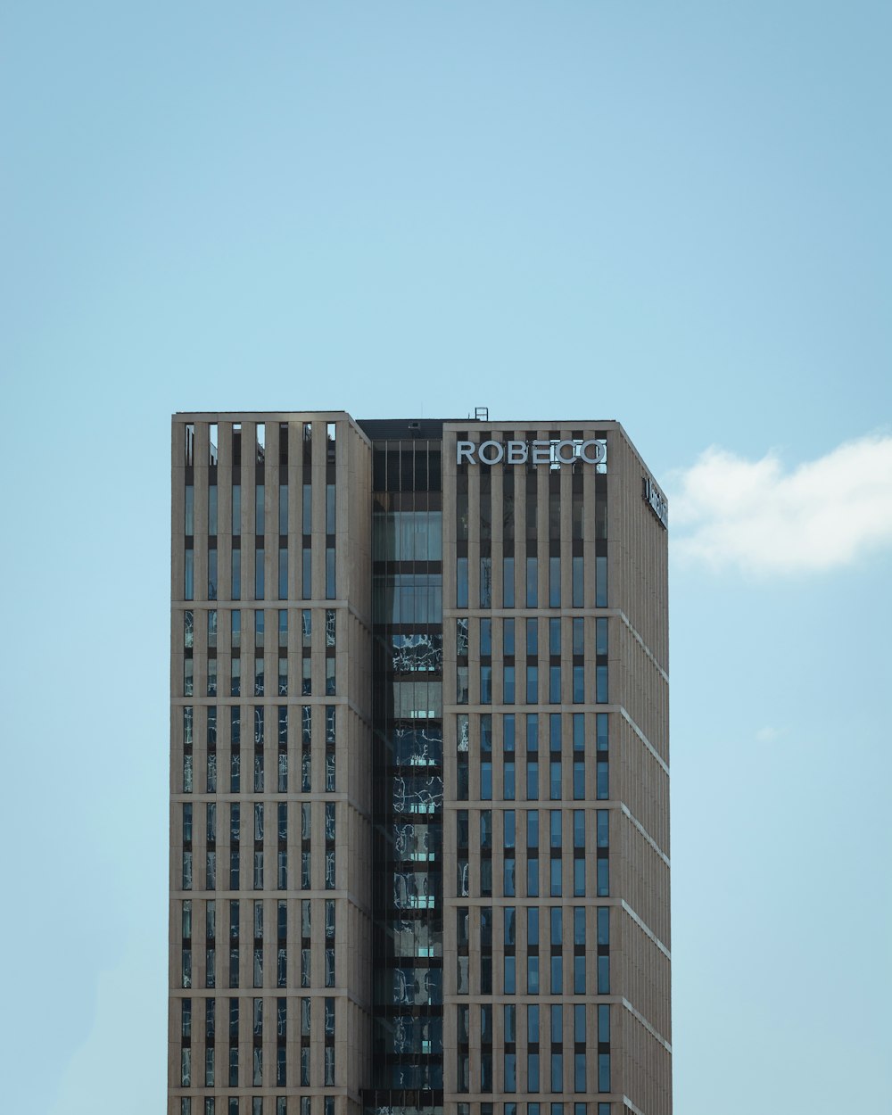 brown concrete building under blue sky during daytime