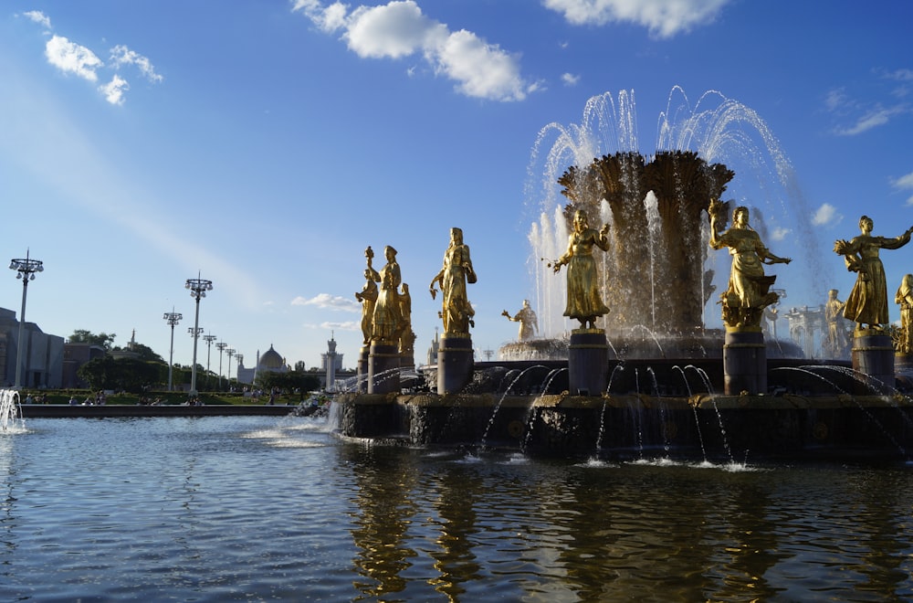 water fountain under blue sky during daytime