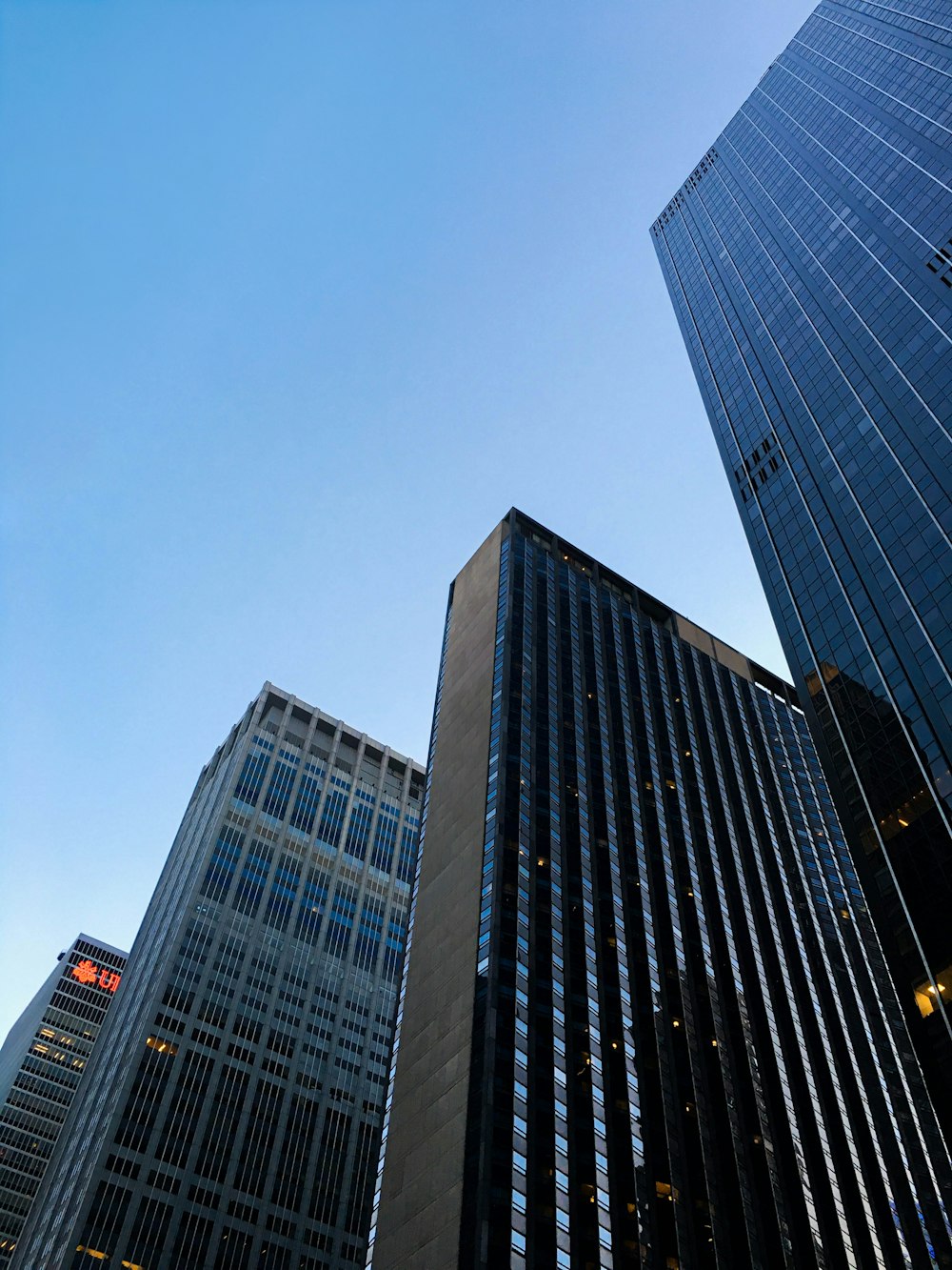 low angle photography of high rise building