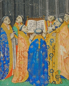 A medieval religious council gathering with cloaked figures in ancient stone halls.