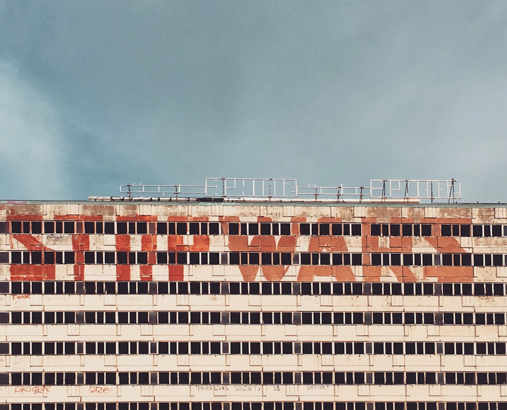 brown concrete building under blue sky during daytime