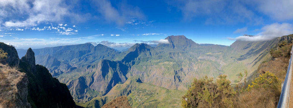 green and brown mountains under blue sky during daytime