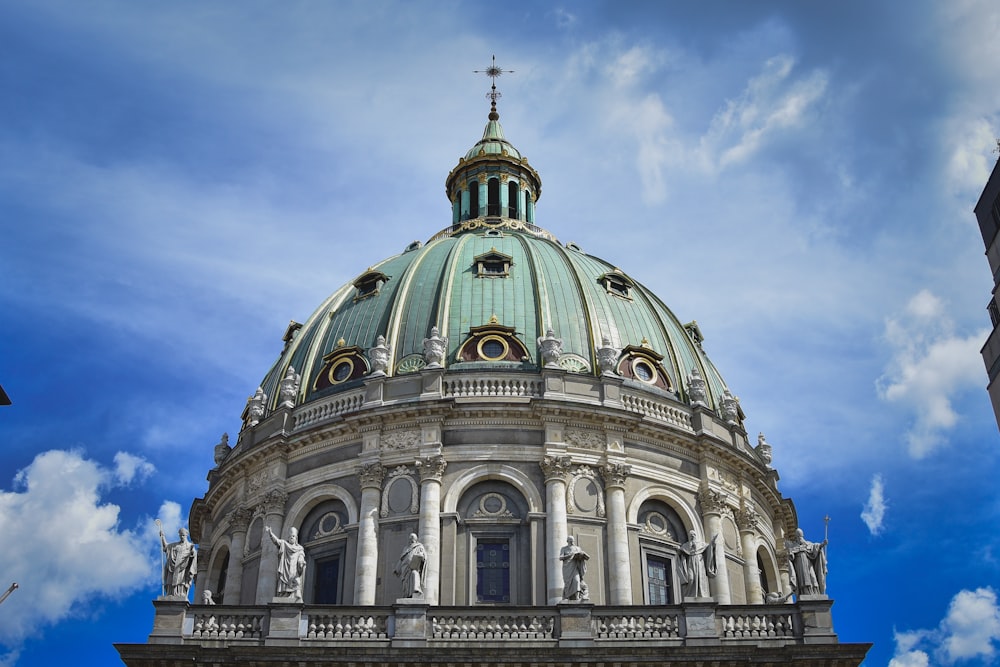 white and gray dome building under blue sky during daytime