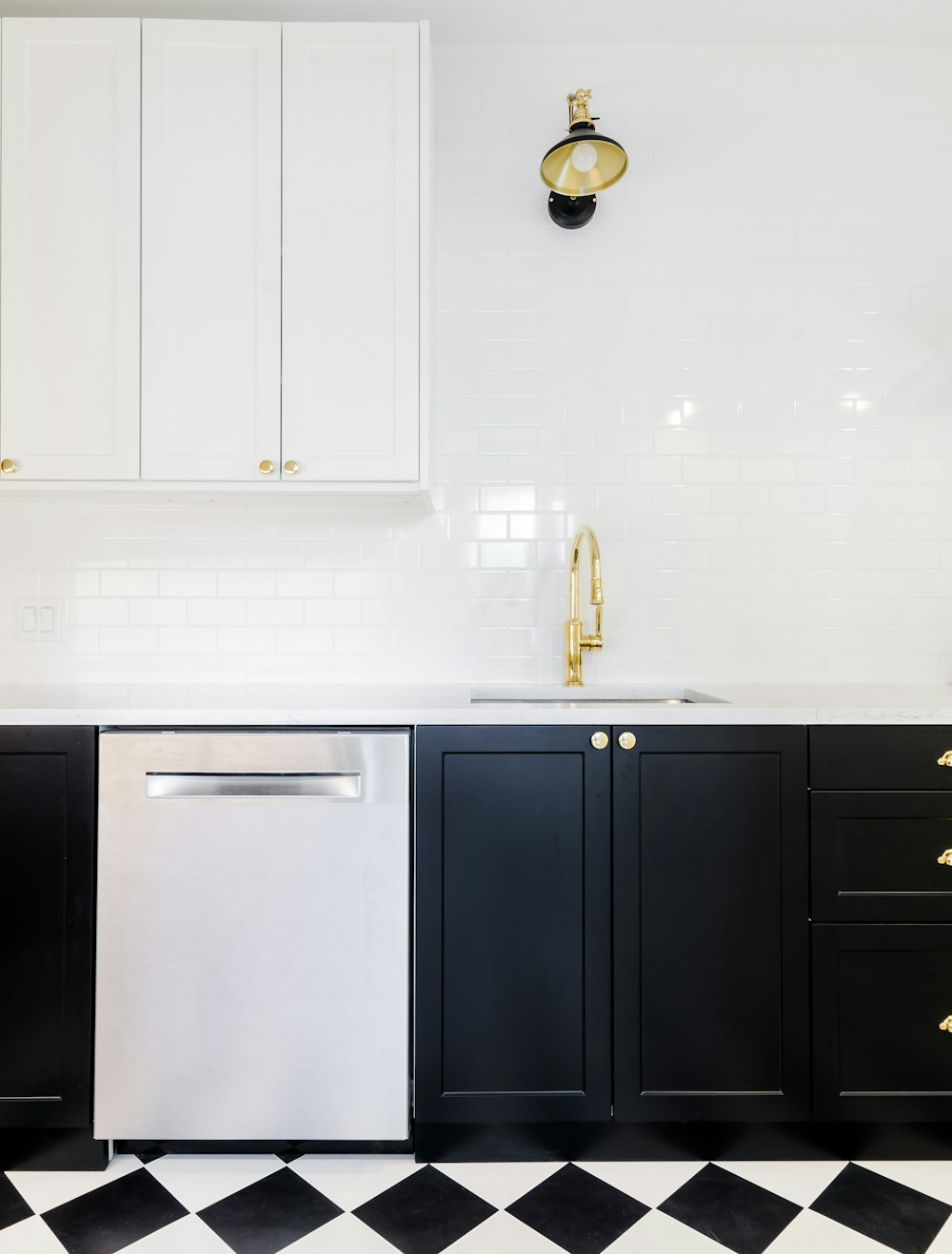 white wooden cabinet beside white wall