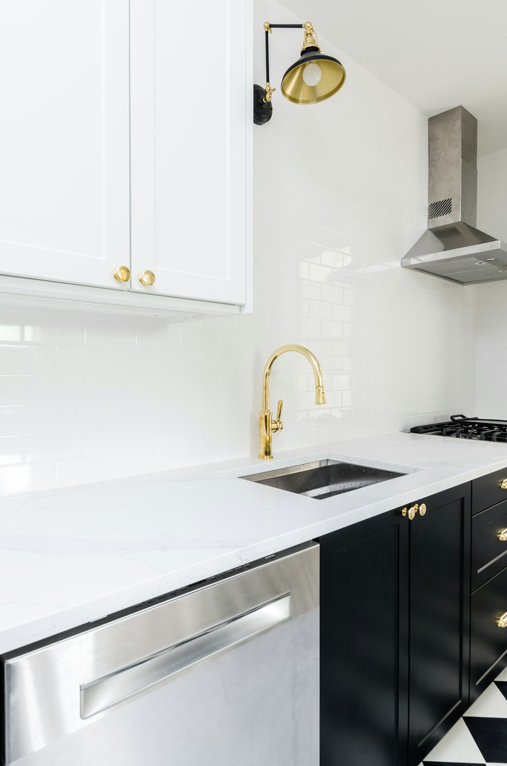 white wooden kitchen cabinet near white wooden kitchen cabinet