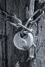 gray scale photo of chain link fence