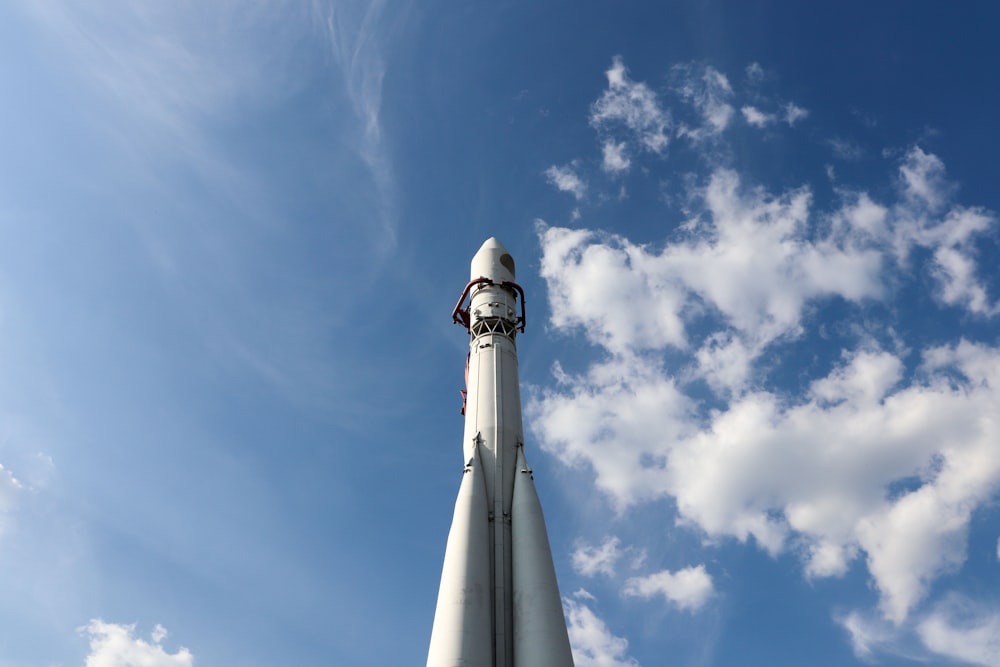 white and gray space ship under blue sky during daytime