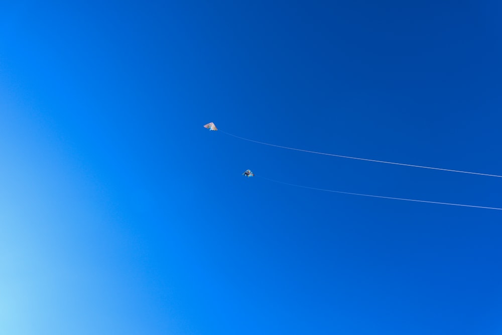 white airplane in the sky during daytime