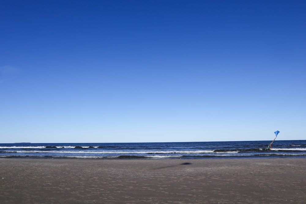 blue sky over beach during daytime