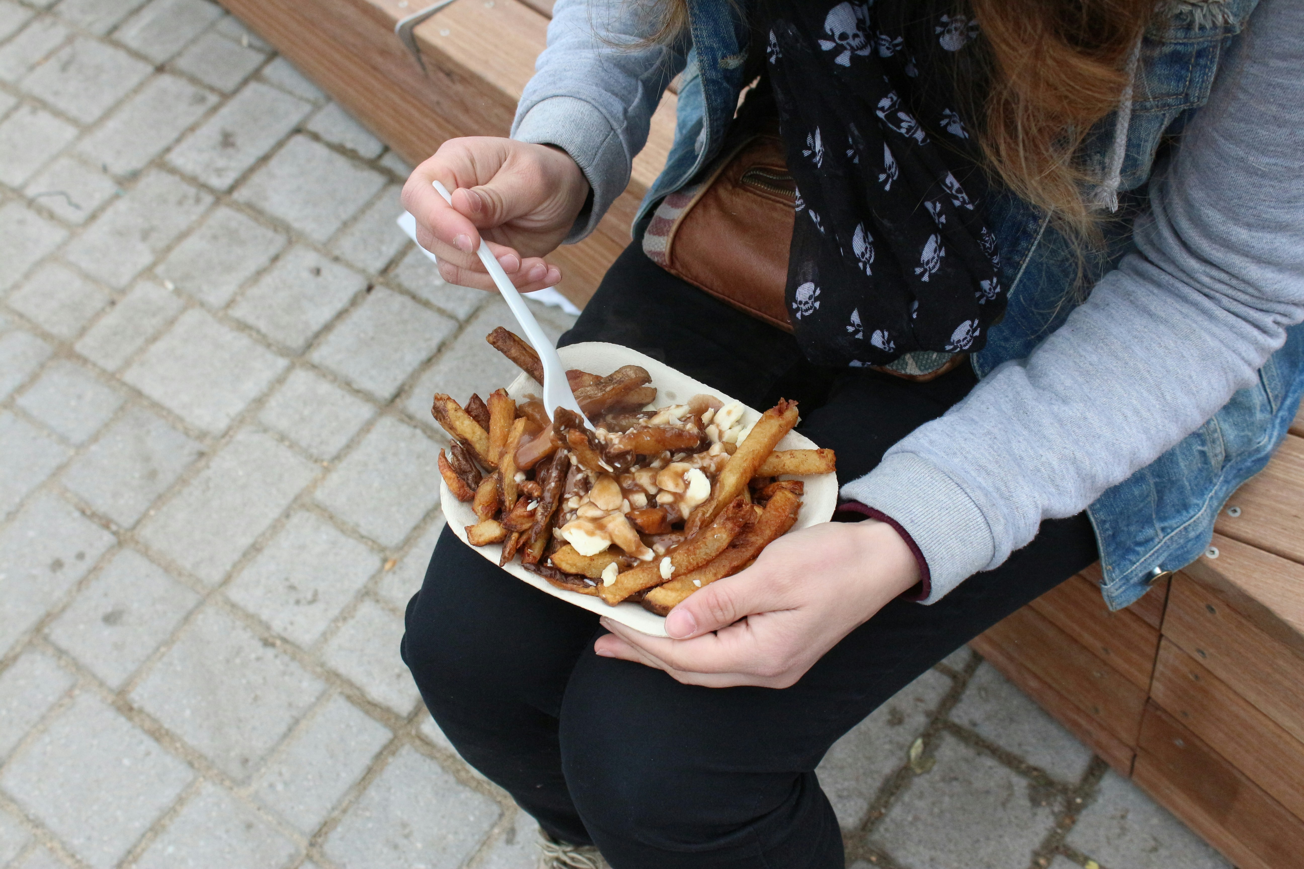 Enjoying Poutine from a Food Truck.