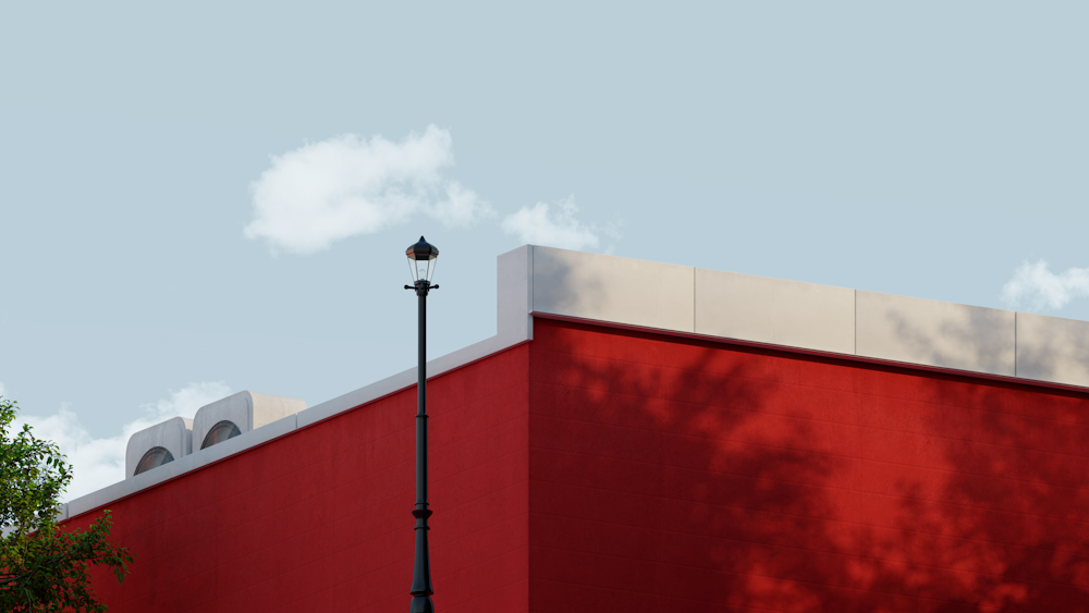 red and white concrete building under white sky during daytime