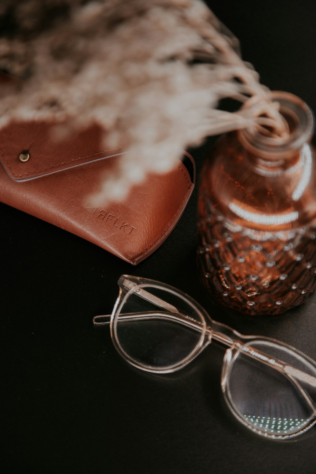 white rope on brown leather bag