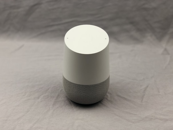 A modern smart speaker showcasing sleek design.