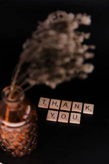 clear glass bottle with white powder