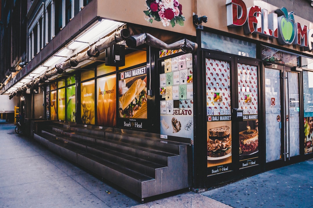 black and white store front during daytime