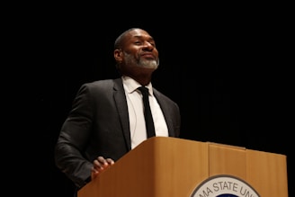 man in black suit jacket