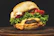 A juicy burger layered with fresh lettuce, tomato, and melted cheese on a soft bun.