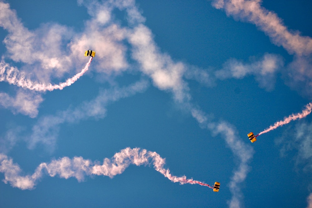 yellow and black plane in the sky