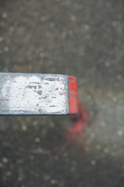 Close-up of a metal surface coated with vibrant powder paint showing smooth texture.