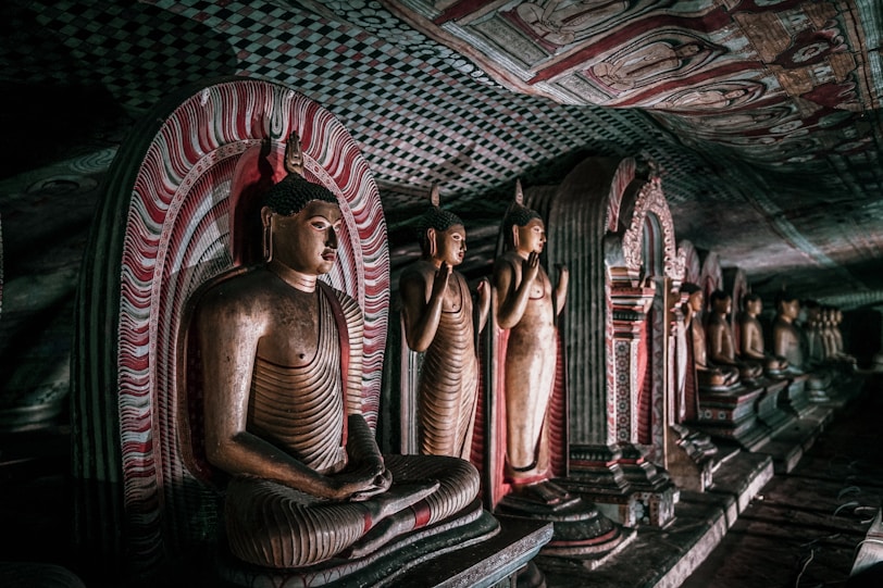 The Curious Traveller: Buddhism in Sri Lanka buddhas in cave