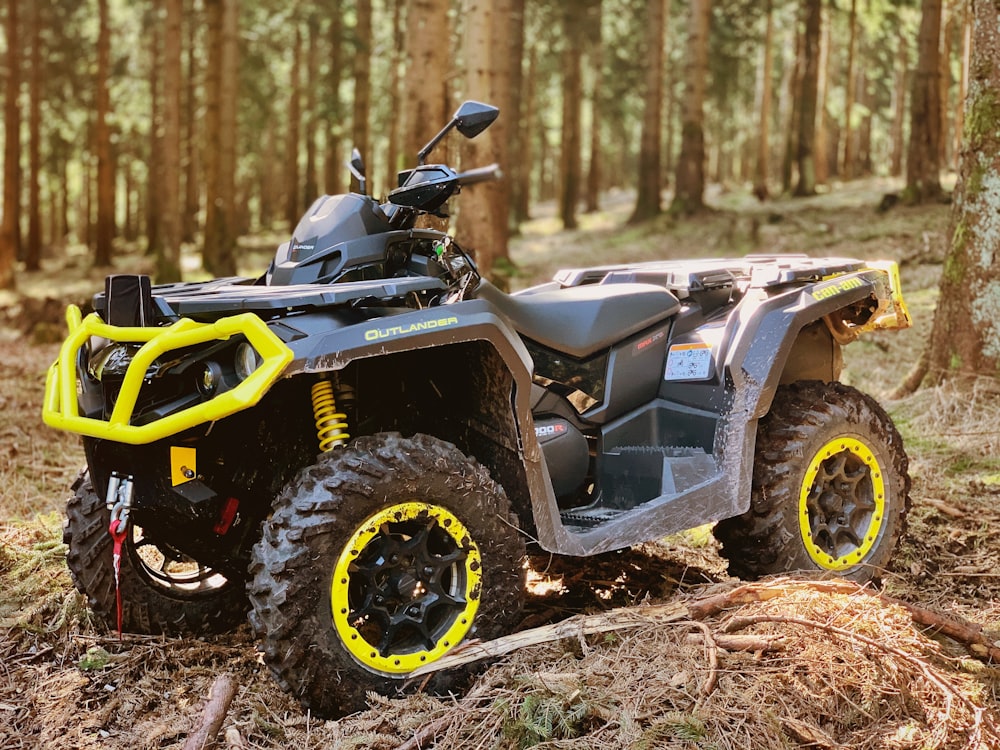 black and gray atv on brown soil