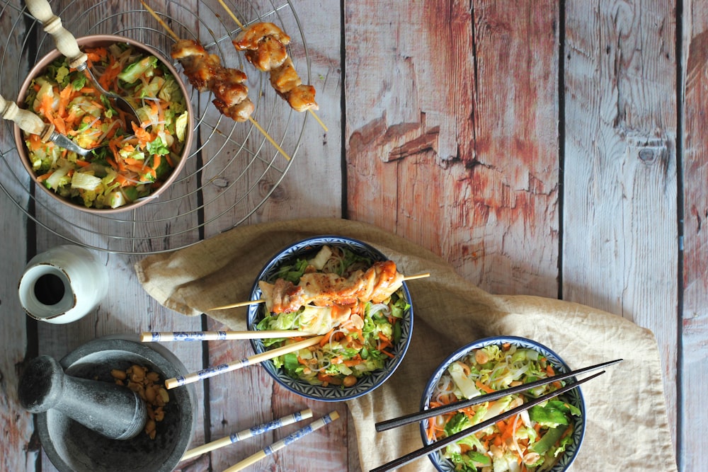 cooked food on blue ceramic bowl