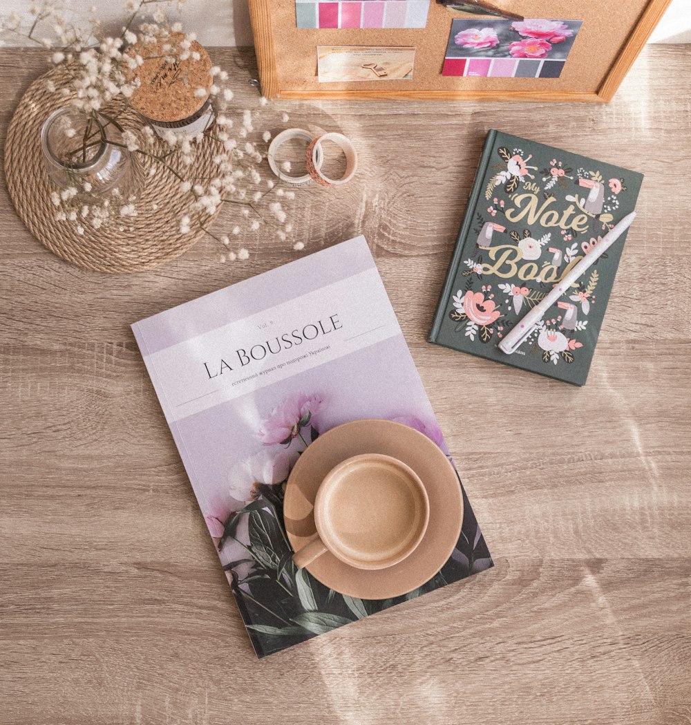 purple and white greeting card on brown wooden table