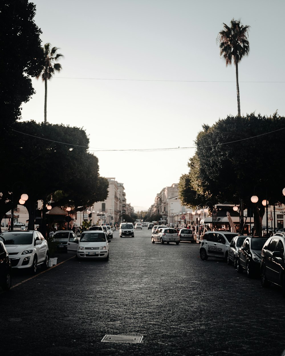 cars parked on the side of the road during daytime