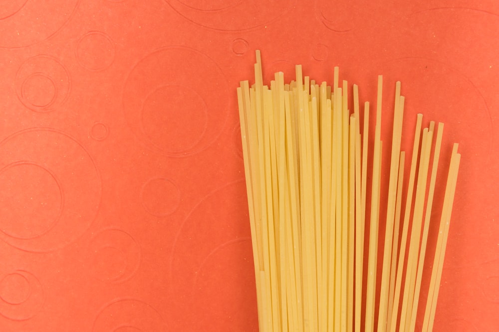 white stick on red textile