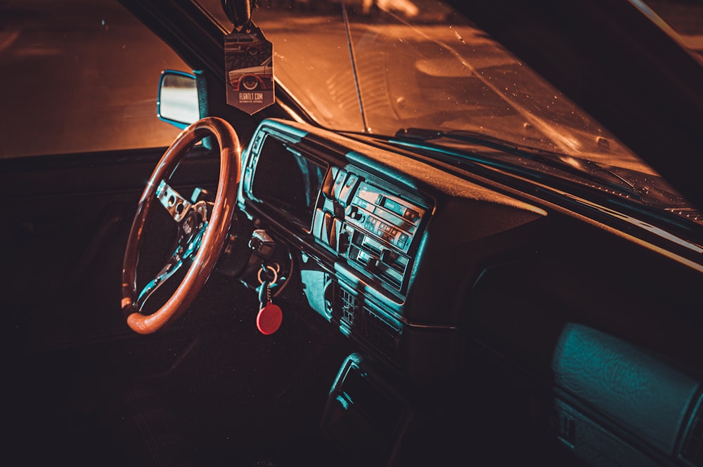 black car with red steering wheel