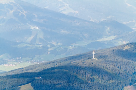 aerial view of green trees and mountains during daytime in Dachstein glacier Austria