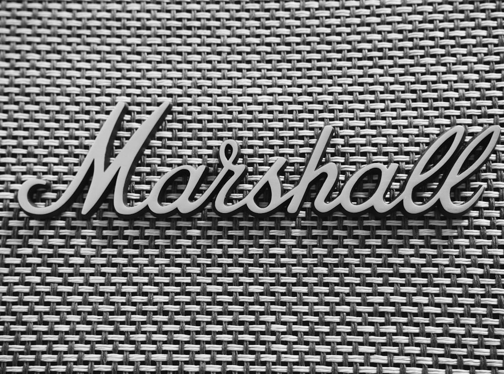 a black and white photo of the word marshall