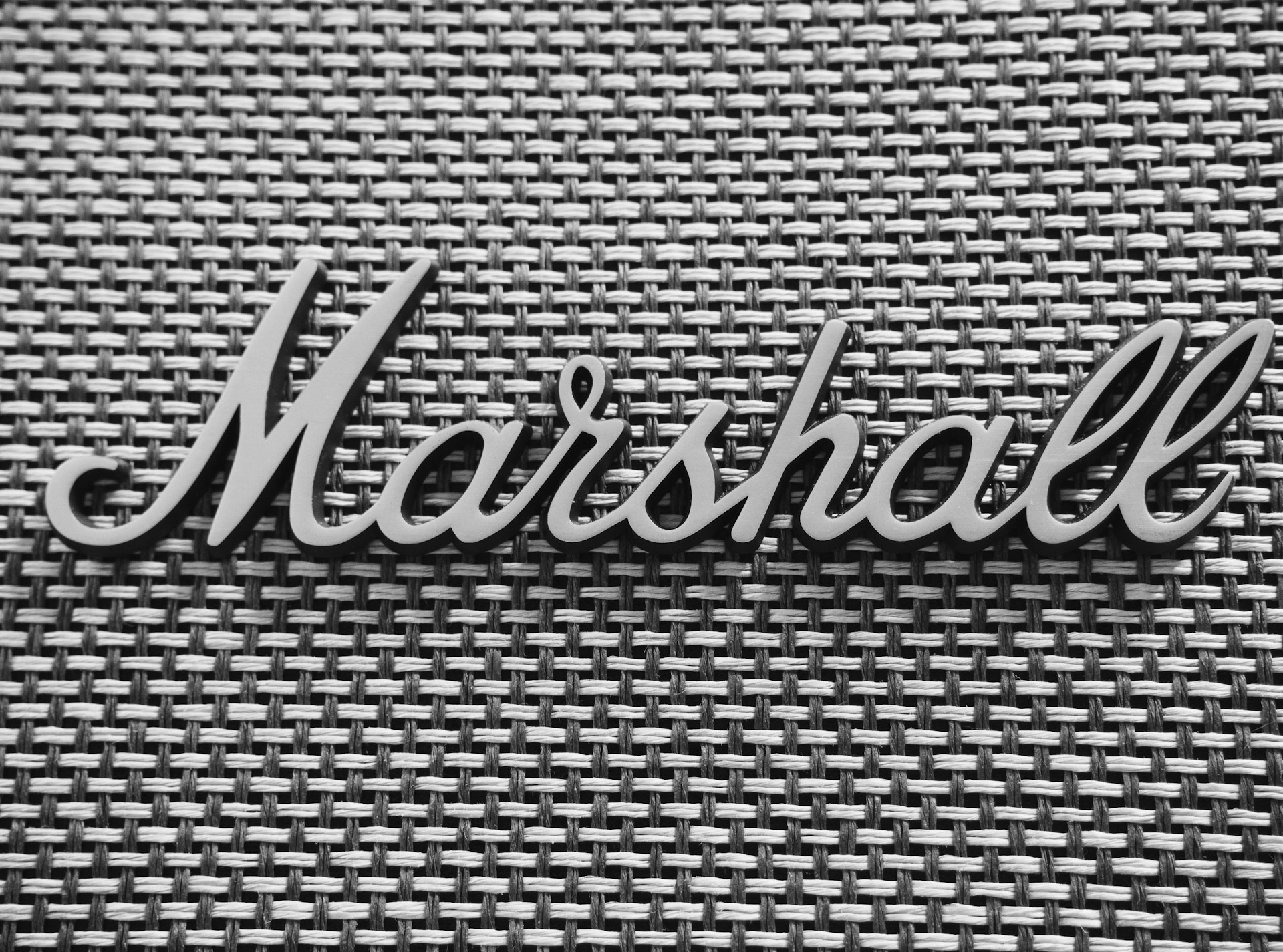 a black and white photo of the word marshall