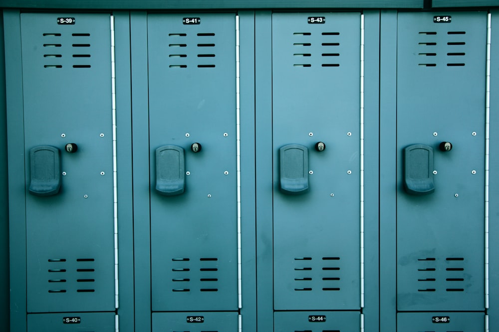 gray steel locker with padlock